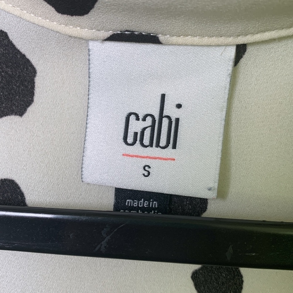 CAbi Sleeveless Collared Blouse in Cream with Black and Mustard Spot Print - Picture 2 of 6